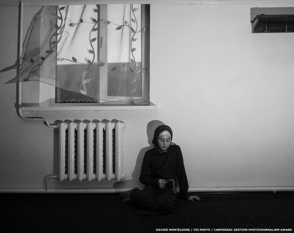 A girl praying in the only official female madrassa in Chechnya and in Russia