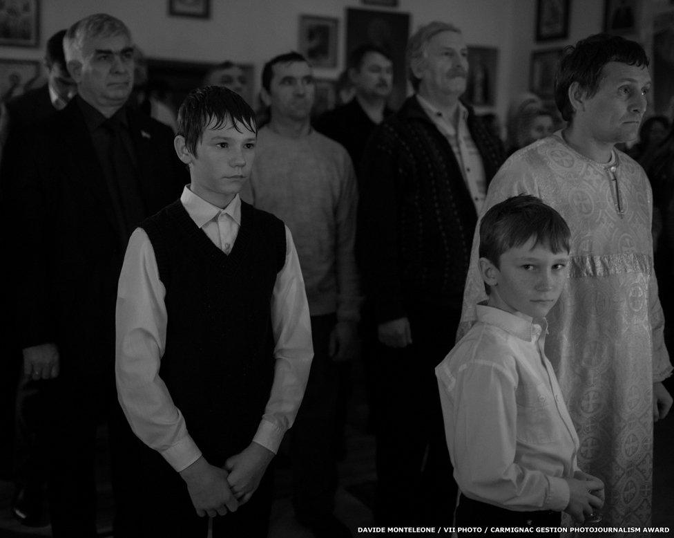 Christian Orthodox celebration of kupanie v prorubi (bathing in a hole in the ice) during the Epiphany.