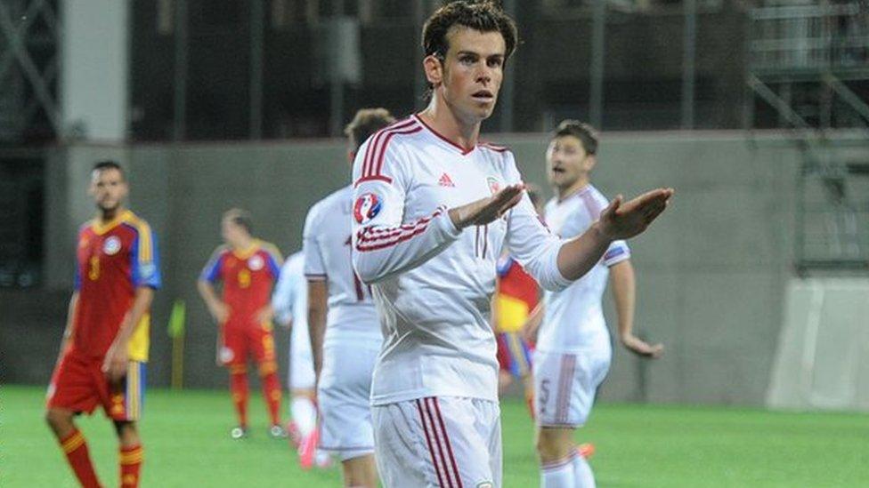 Gareth Bale urges the crowd to calm down