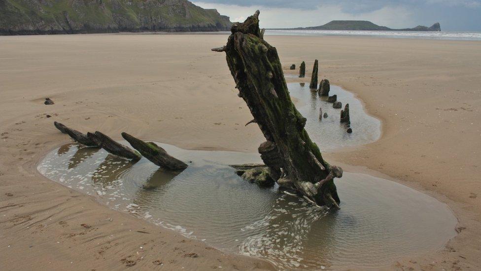 The ancient Helvetia shipwreck at Rhossili in Swansea.