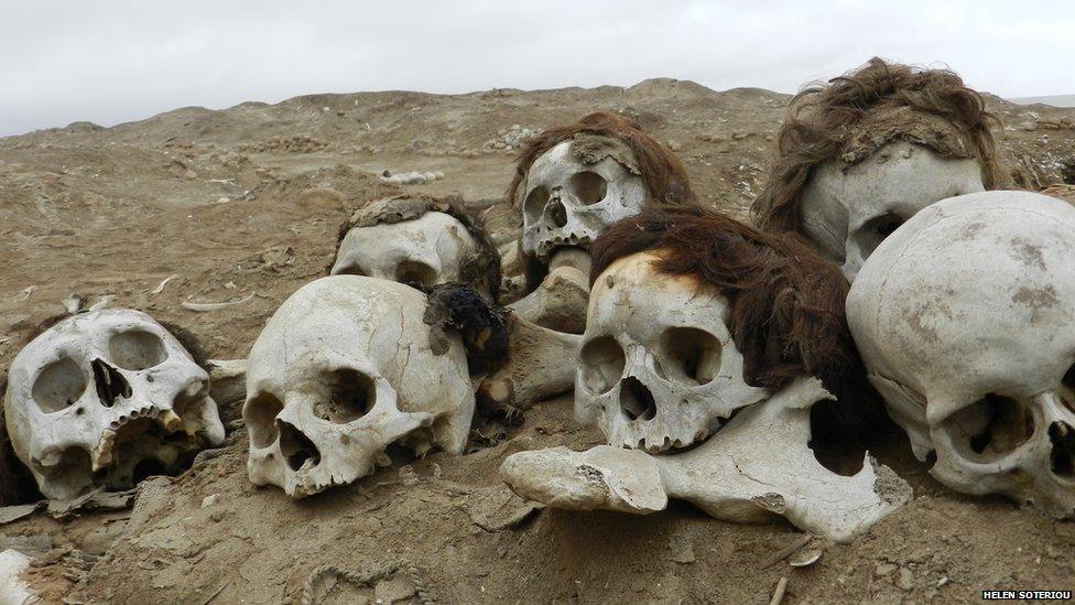 Skulls lying on the ground in Huaca Malena