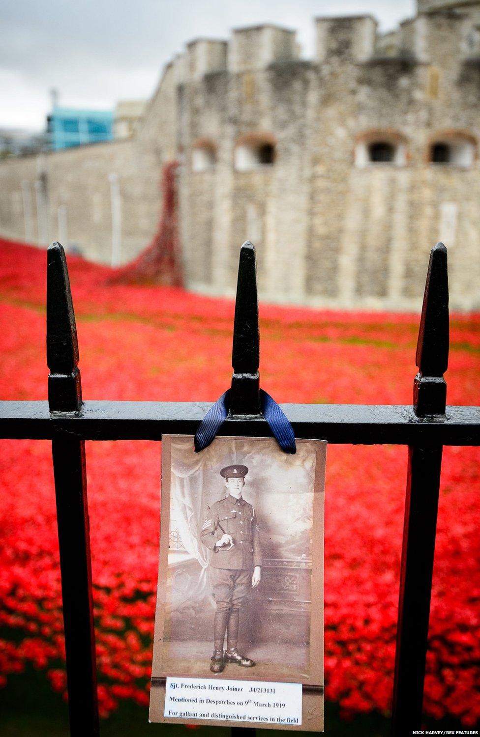 Photograph of soldier on the railings