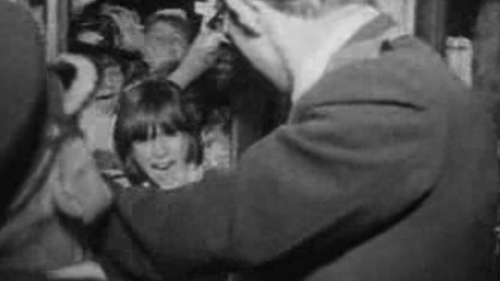 Beatles fans trying to enter the Capitol Theatre in Cardiff