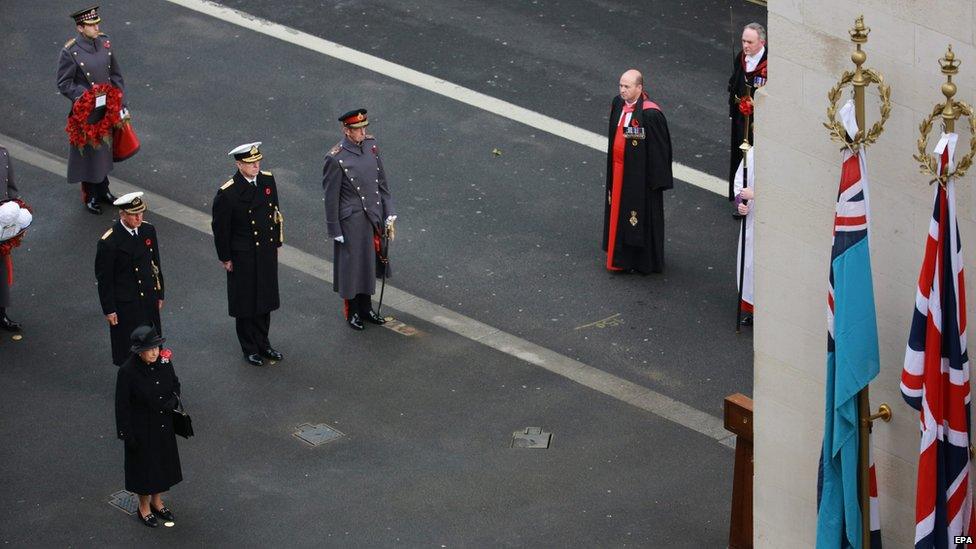 Queen Elizabeth II (L) leading the Remembrance Sunday service