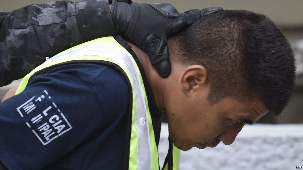 A municipal policeman is arrested in Iguala on 17 October for his alleged involvement in the disappearance of 43 students