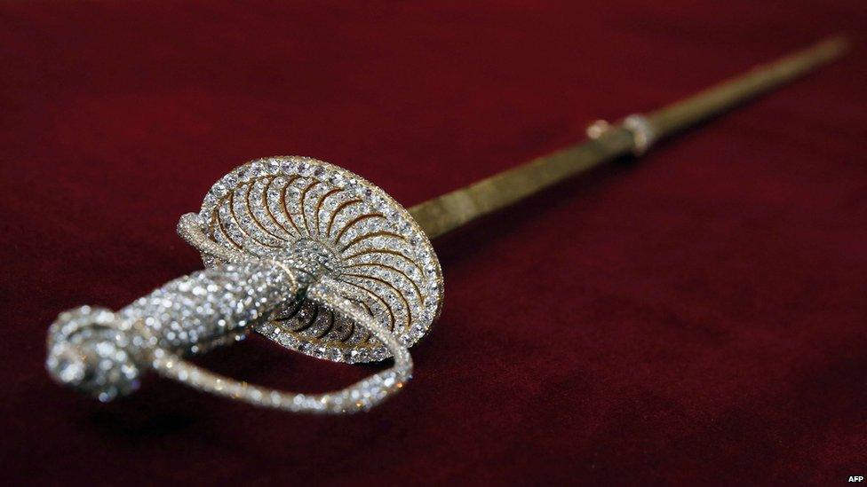 A photo taken on October 28, 2014 shows a diamond-incrusted sword - part of the royal family of Monaco's private Napoleon collection - that once belonged to French Emperor Napoleon I, on display at the Osenat auction house in Paris