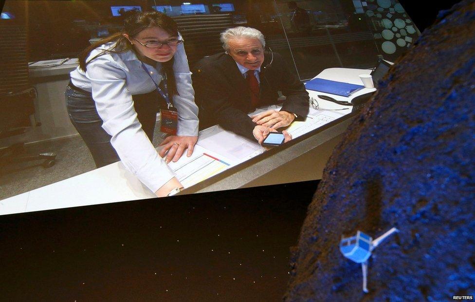 Philae model in front of big screen