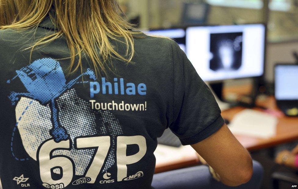 Scientist wearing touchdown T-shirt