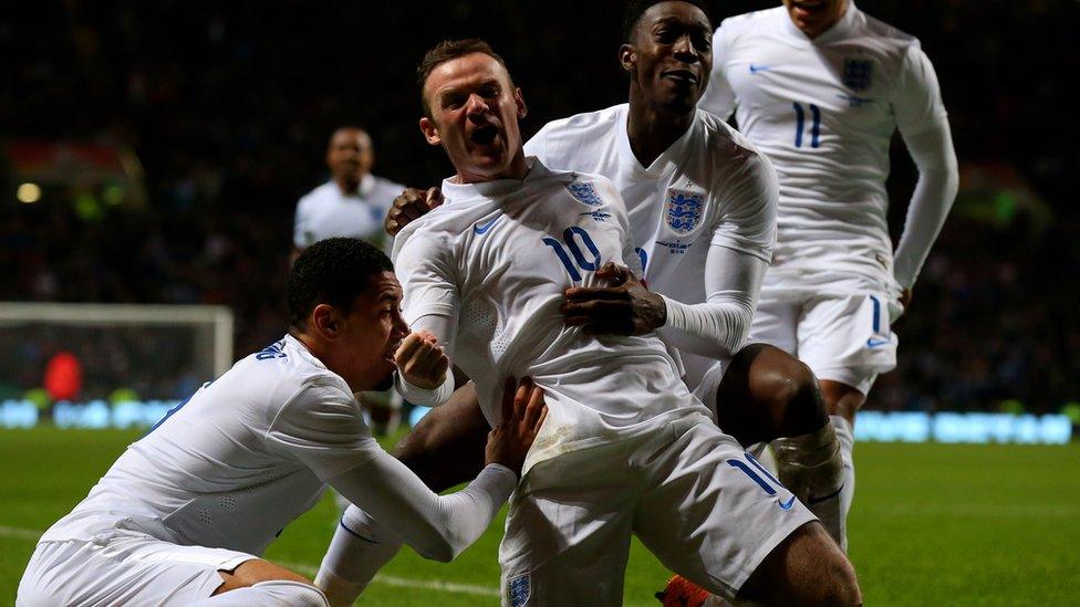 Wayne Rooney celebrates header against Scotland