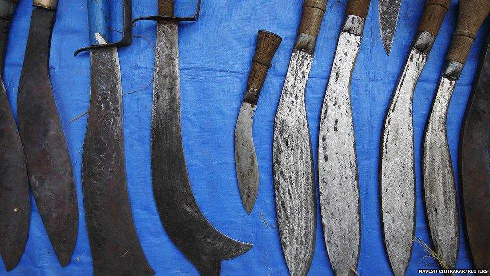 Sacrificial knives on sale at a Hindu festival