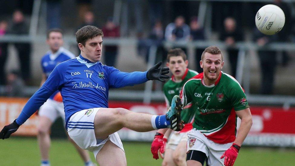 Gary Boyle of Warrenpoint in action against Inniskeen's Robert Lorenz during the Ulster Intermediate Club Championship final