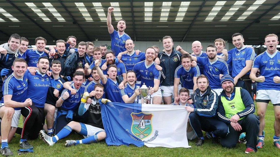 Smiles all round as the players of Warrenpoint pose for a happy team photo after winning the 2014 Ulster Intermediate Club Football Championship