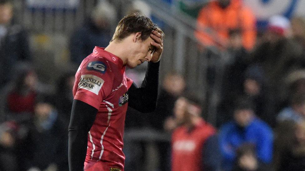 Liam Williams walks off after being shown a yellow card in Belfast