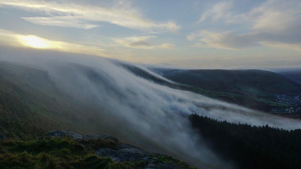 Mist rolling over the hills