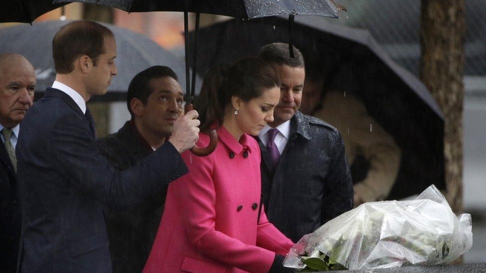 The Duke and Duchess of Cambridge laying flowers at a reflecting pool at the National September 11 Memorial and Museum in New York