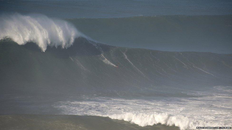 Surfer at Nazare on Thursday