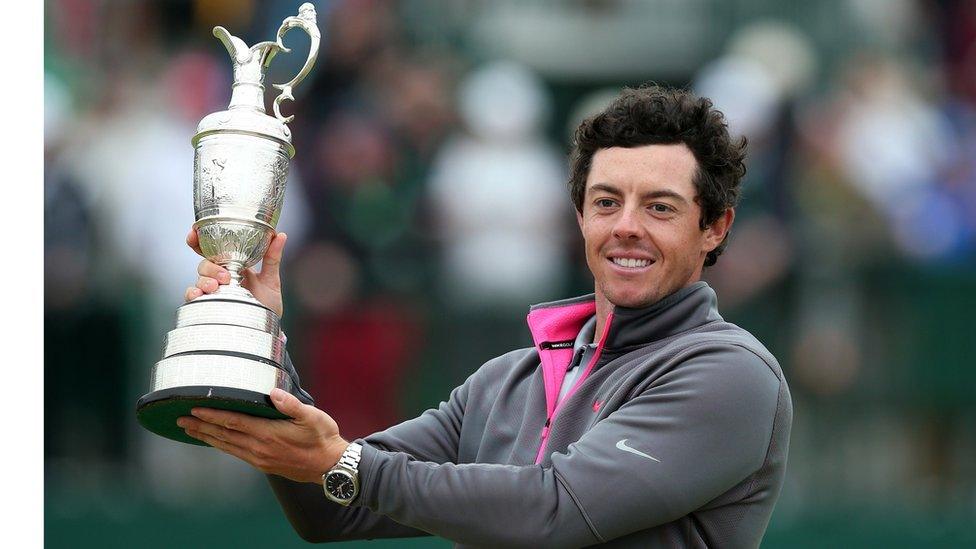 Rory McIlroy lifts the Claret Jug after winning The 2014 Open Championship at Royal Liverpool in July. McIlroy saw off Rickie Fowler and Sergio García to capture the third major of his career.