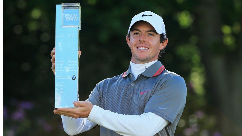 Rory McIlroy celebrates with the BMW PGA Championship trophy at Wentworth. He carded a six-under-par 66 final round to beat Thomas Bjørn, who started seven strokes clear of McIlroy on the final day in May.