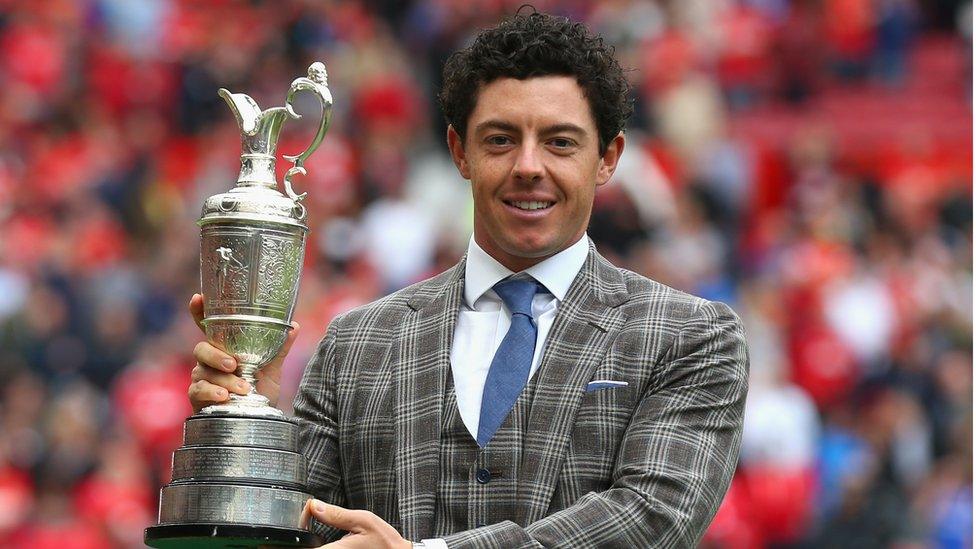 Rory's choice of suit became a talking point in the media on a trip to Old Trafford to display the Claret Jug