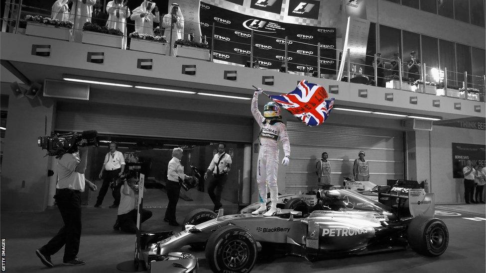 Lewis Hamilton celebrates winning the Abu Dhabi Grand Prix