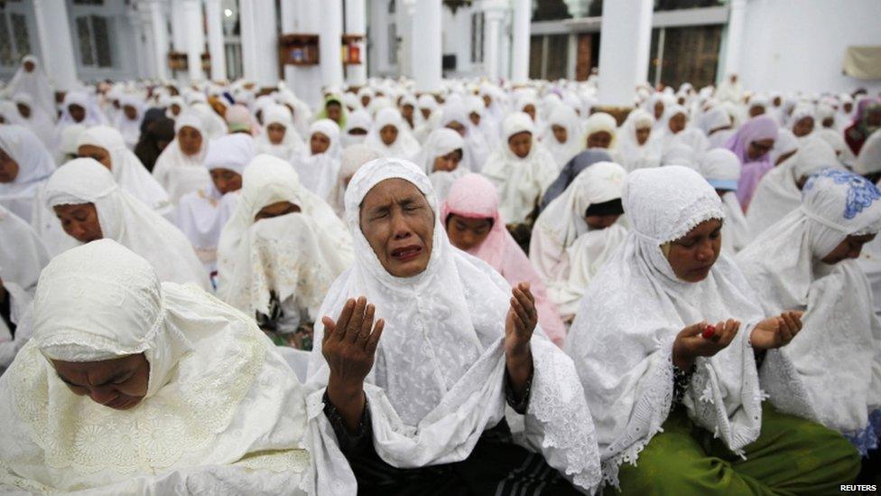 Women pray at Banda Aceh's Grand Mosque. Photo: 25 December 2014