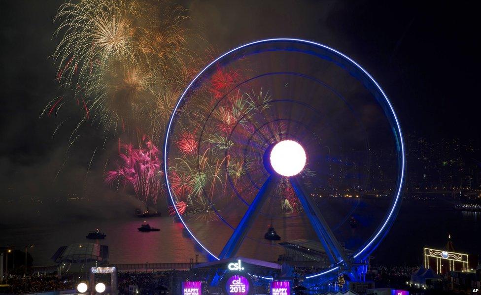 Fireworks explode over the Victoria Harbour to celebrate the 2015 new year in Hong Kong, Wednesday 1 January 2015