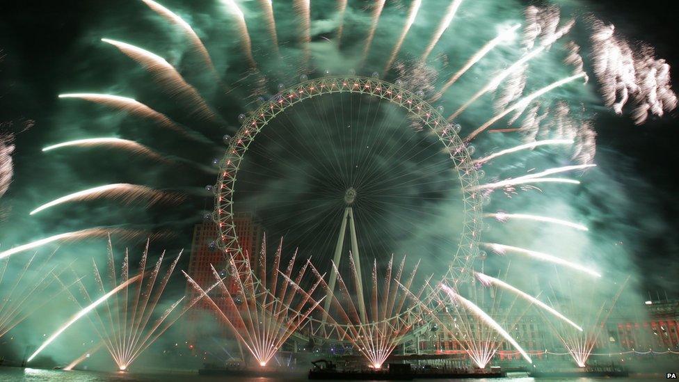 Fireworks explode over London on 1 January 2015