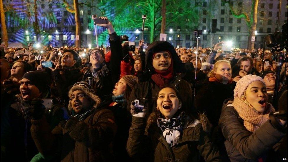 Revellers watch London fireworks