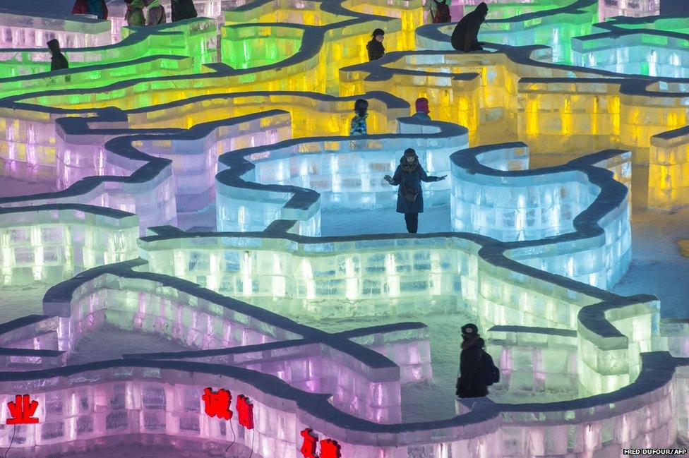 Visitors walks in an ice maze