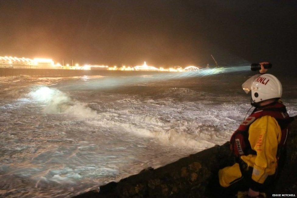 Coastguard and lifeboat teams spent the night looking for two men who are believed to have drowned