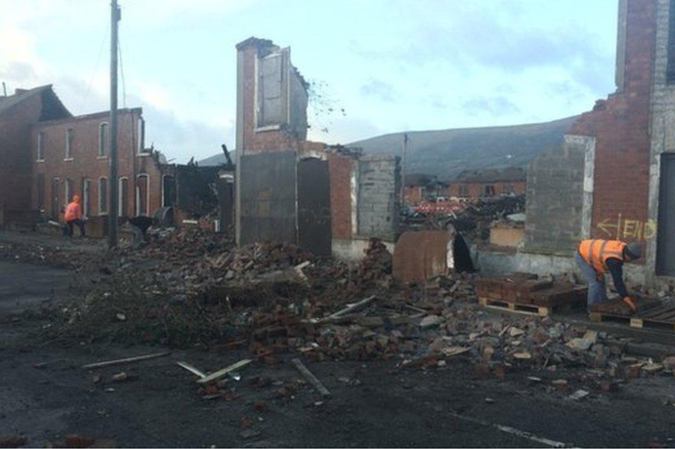 Derelict buildings in west Belfast have partially collapsed in strong winds in west Belfast