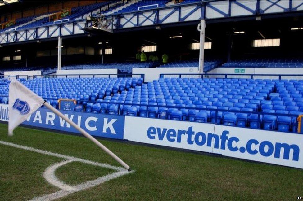 A view of one of the corner flags blowing in the strong winds before the Barclays Premier League match at Goodison Park, Liverpool