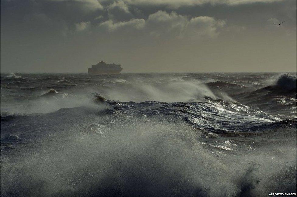 A ferry battles the waves after leaving the harbour in Newhaven on the south coast of England