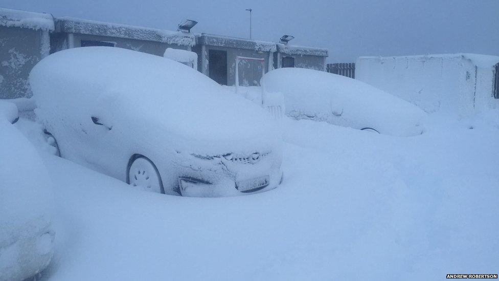 Snow covered cars at Dalwhinnie