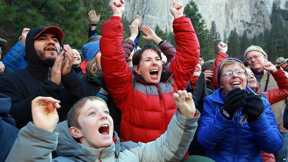 Gaelena Jorgenson raises her arms as her son Kevin completes a free climb of El Capitan