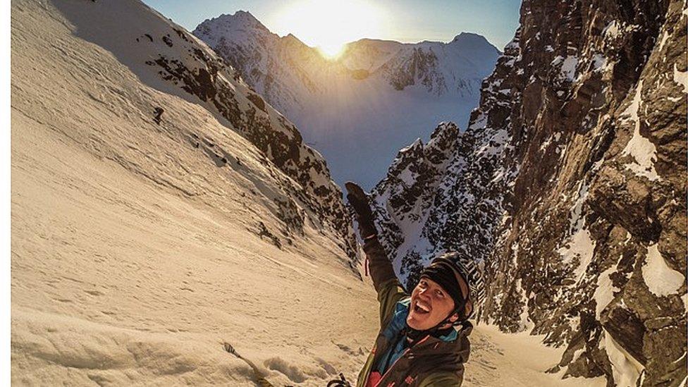 Xavier De Le Rue enjoys the midnight sun before heading down an extremely steep descent. Within the space of a month from March to April Svalbard goes from total darkness as the sun still sits under the horizon to being bathed in light 24 hours a day. During that period the length of daylight grows by 45 minutes every day - a staggering fact that gives you an insight into the extremes life is subjected to this far north