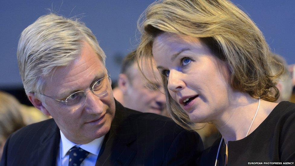 Belgium's King Philippe (L) and Queen Mathilde attend the opening session