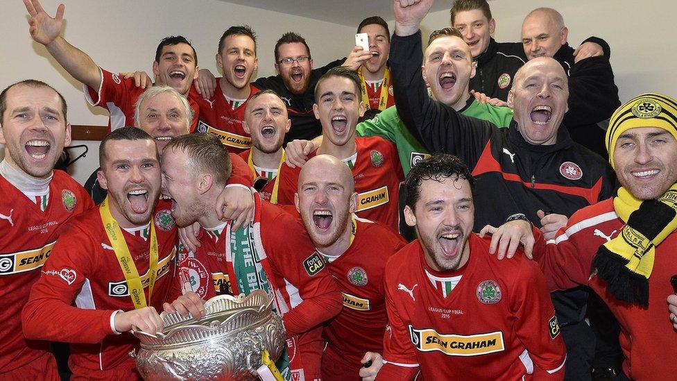 The party begins in the Cliftonville changing room after the Belfast side beat Ballymena United 3-2 in the 2014-15 Irish League Cup final