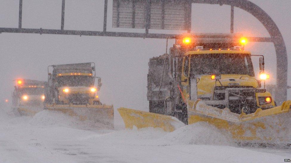 Huge snow ploughs are working to try to clear roads