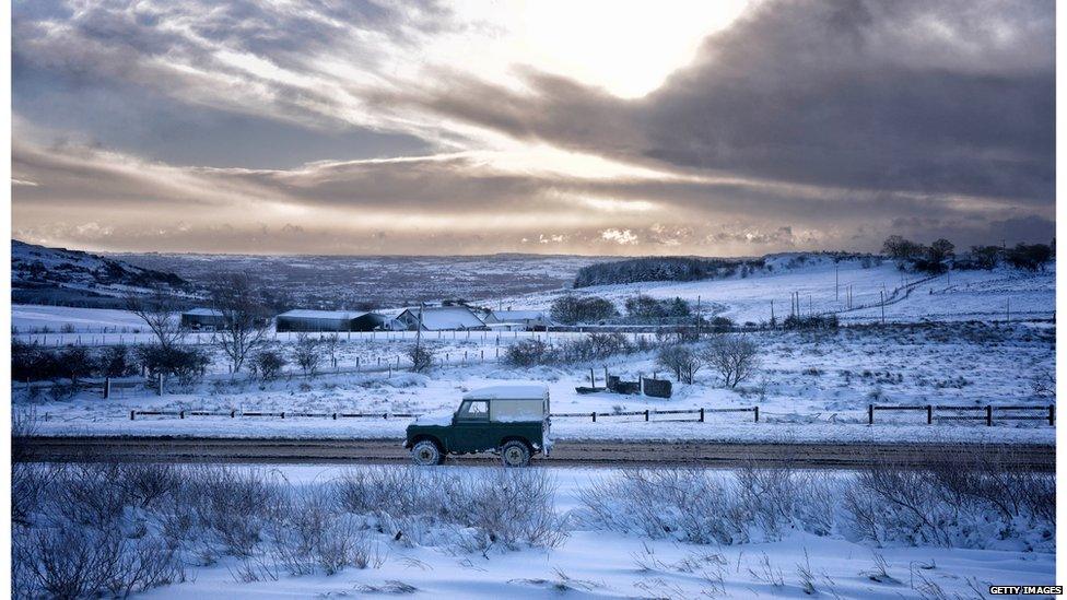 Motorists make their way over Hannahstown Hill on January 29, 2015 in Belfast,