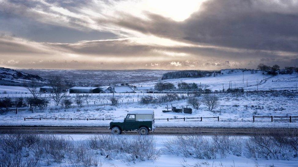 Motorists make their way over Hannahstown Hill on January 29, 2015 in Belfast,