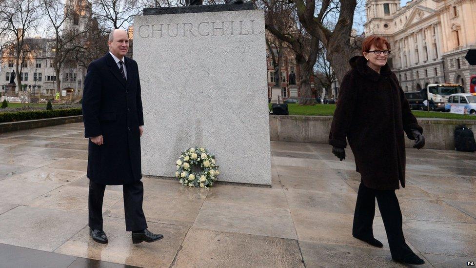 Randolph Churchill and Celia Sandys, the great-grandson and granddaughter of Churchill, lay a wreath at Parliament Square earlier