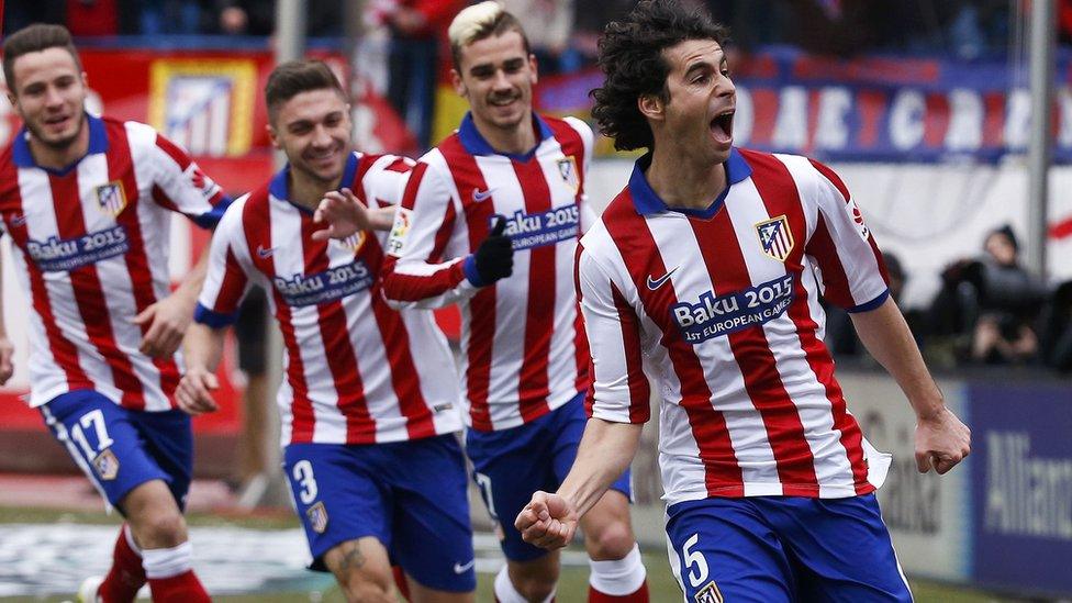 Tiago celebrates his opening goal for Atletico Madrid