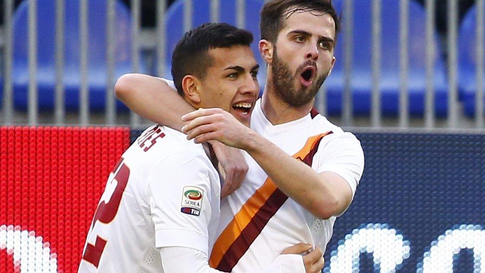 Leandro Paredes and Miralem Pjanic celebrate Roma's second goal at Cagliari