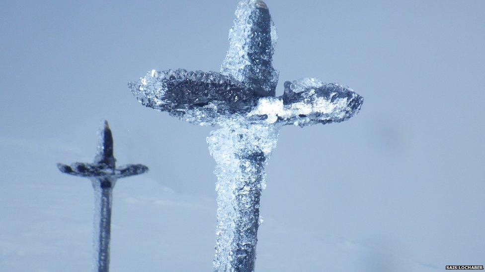 Icy rime on ski poles