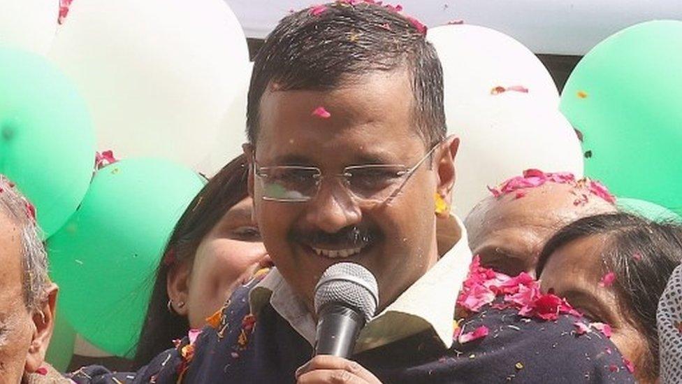 Aam Aadmi Party (AAP) leader Arvind Kejriwal addresses his supporters outside their party office in New Delhi, India 10 February 2015