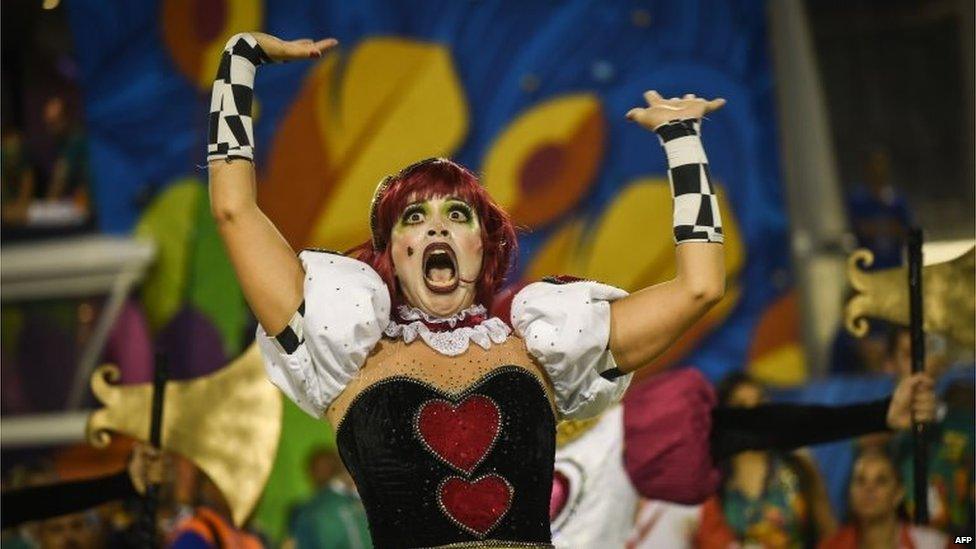 Revellers of the Grande Rio samba school perform at the Sambadrome in Rio de Janeiro on 16 February, 2015.