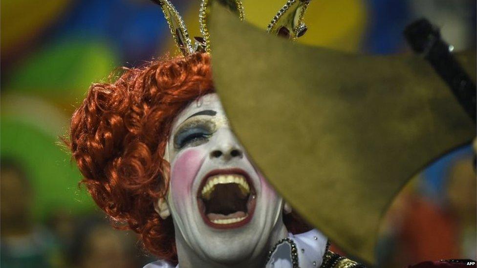 Revellers of the Grande Rio samba school perform at the Sambodrome in Rio de Janeiro on 16 February, 2015.