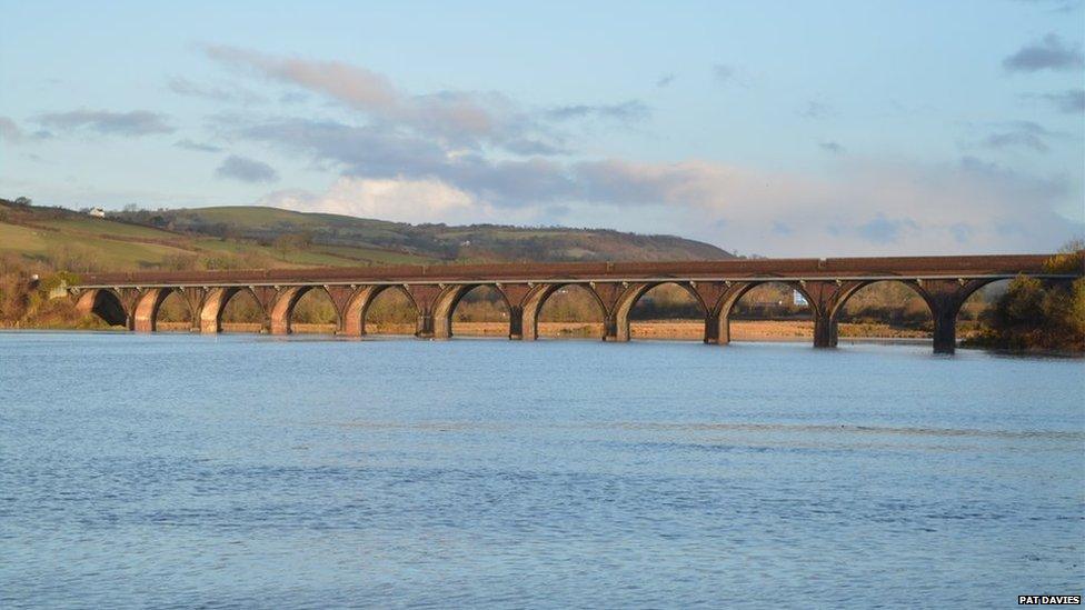 Weekend high tides causing the River Loughor to flood near the Pontarddulais railway viaduct as captured by Pat Davies, of Hendy.