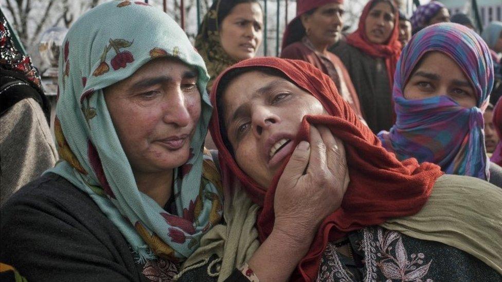 Grieving relatives of Shabir Ahmed Gania, a suspected local militant of Hizbul Mujahideen outfit, during his funeral procession in Kashmir Feb 26, 2015.